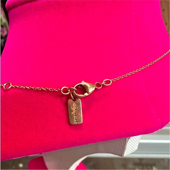 Coach Mini Demi Fine Skull Necklace. - Picture 3 of 3